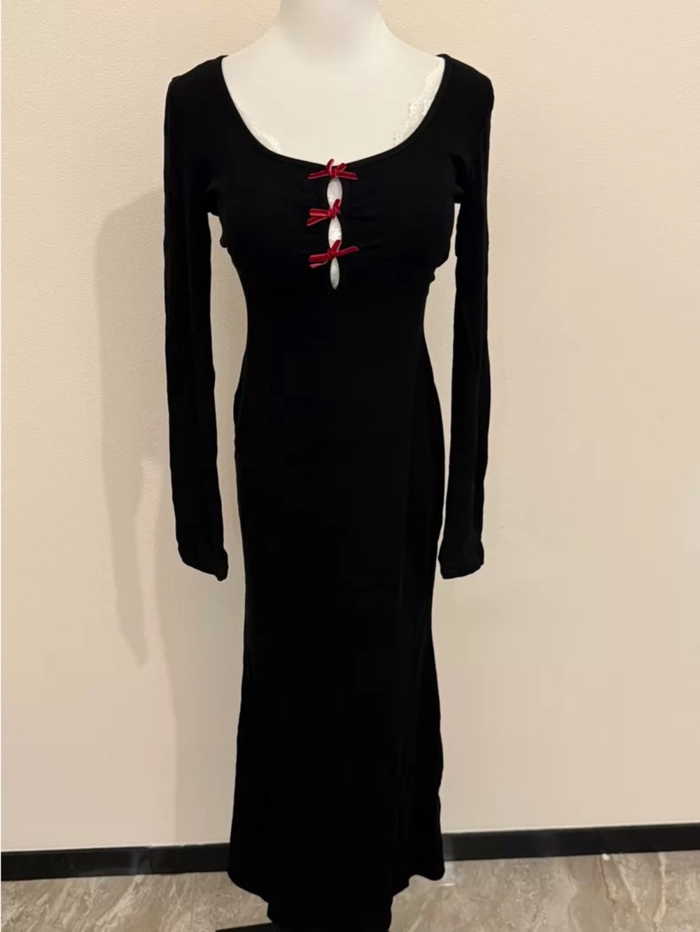 Black Long-Sleeve Maxi Dress with Red Bow Accents